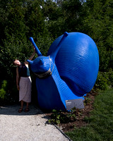 Julie greeted by a snail sculpture