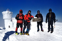 Climbers at the summit of Mt. Washington